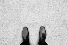 Black Shoes Standing On The Carpet