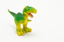 Plastic Dinosaur Toy. Over A White Background