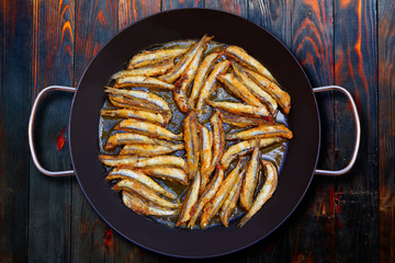 Wall Mural - Boquerones fritos Mediterranean fried anchovies