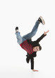© Aleks Kend - Young guy is dancing. Street dance. White background.