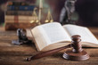 © zolnierek - Law theme, mallet of judge, wooden gavel, books