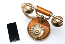 Old Vintage Phone And New Modern Smartphone