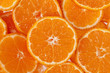 background of slices of clementine fruit