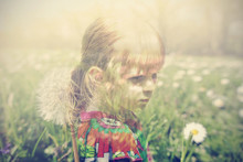 Double Exposure Portrait Of A Little Blonde Girl And Green Grassy Spring Background With Daisies. Image Filtered In Soft, Faded, Retro, Vintage Style; Nostalgic Concept Of Spring And Childhood.