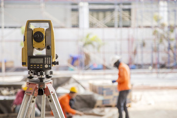 Wall Mural - Surveyor equipment tacheometer or theodolite outdoors at constru