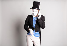 Man Mime  Talking On His Cell Phone. April Fool's Day Concept.