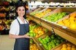 © WavebreakmediaMicro - Portrait of a smiling worker taking a fruits