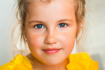 cute little girl in yellow