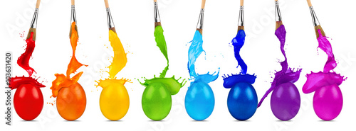 easter egg color splash row with paintbrushes isolated on white background