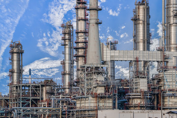 oil refinery plant against blue sky