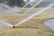 Sprinkler watering in golf course