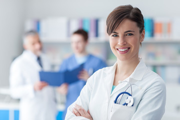 Wall Mural - Female doctor posing in the office