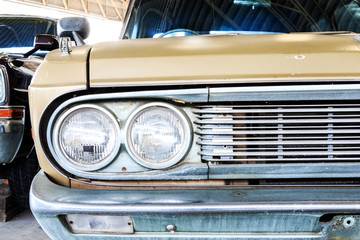 Wall Mural - Close Up of Headlight Lamp Vintage Classic Car. (Vintage Effect Style)