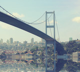 Fototapeta Nowy Jork - Bridge over Bosphorus at sunset. Travel and business concept