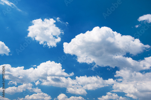 Naklejka ścienna White clouds in blue sky.