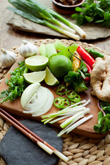 Wall Mural - asian food cooking board ingredients lime chili 