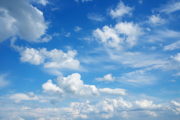 Wall Mural - Beautiful cloudscape over horizon. Blue sky and clouds.