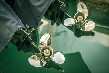 Wall Mural - two boat engine with propeller details shot