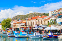 Colorful Houses In Pythagorion Port Full Of Fishing Boats, Samos Island, Greece