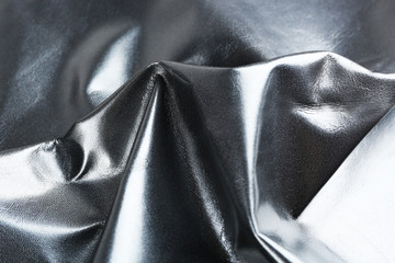 Black leather texture close up