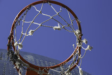 Orange Basketball Hoop On Blue Sky