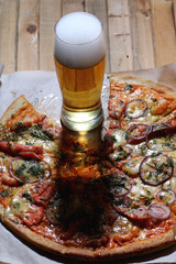 Wall Mural - pizza and a glass of beer