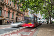 Blurred Red Bus In Sydney