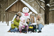 © aletia2011 - family playing in fresh snow