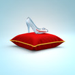 Cinderella glass slipper on the red pillow side view