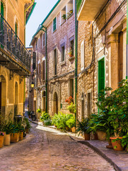 Fototapete - Picturesque street of a old mediterranean village