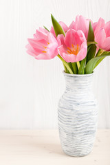 Canvas Print - Fresh pink tulips in a  jug