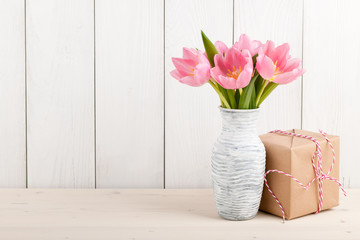 Canvas Print - Fresh pink tulips and gift box