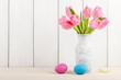 Fresh pink tulips and Easter eggs