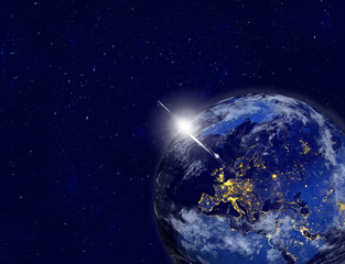 Wall Mural - planet earth with appearing sunlight. visible city lights. elements of this image furnished by nasa.