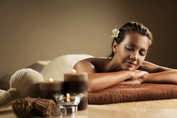 the girl relaxes in the spa salon