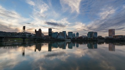 Wall Mural - UHD 4k Timelapse Movie of Clouds Movement and Water Reflection along Willamette River with Downtown City Skyline and Hawthorne Bridge in Portland Oregon 4096x2304