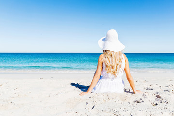 Young woman relaxing on the beach