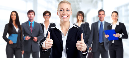 Happy business woman and group of workers.