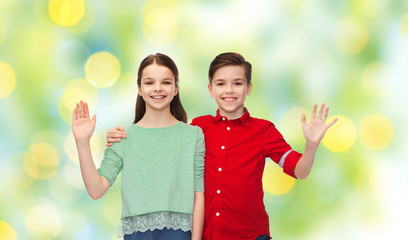 Poster - happy boy and girl waving hand