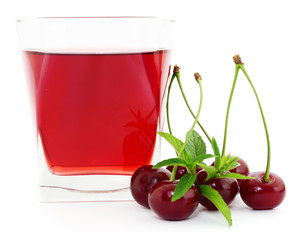 Wall Mural - Cherries and a glass of cherry juice