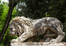 Lion Sculpture In Garden Of Villa Borghese. Rome, Italy