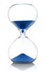 © photology1971 - Hourglass with running blue sand over white