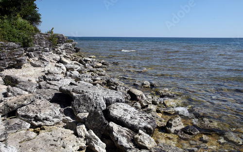 Rocky Shores Define The Coastline Of Lake Michigan At Cave