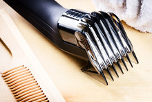 Setting With Hair Clipper And Wooden Comb