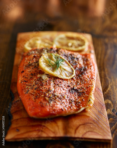 Fotografie, Obraz seasoned salmon cooked on cedar plank with dill and lemon