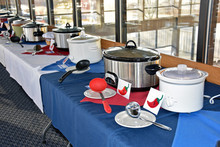 Row Of Crock Pots For A Chili Cook Off In A Restaurant