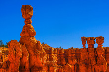 Great Spires Carved Away By Erosion In Bryce Canyon National Park, Utah, USA. The Largest Spire Is Called Thor's Hammer