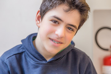 Boy smiling with braces