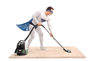 Poster - Young superhero vacuuming a carpet