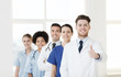 © Syda Productions - group of happy doctors at hospital